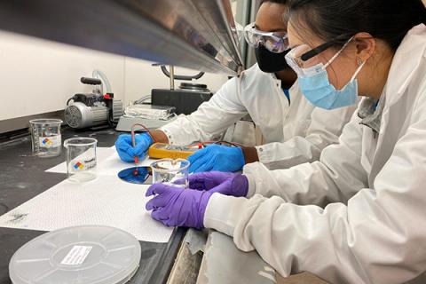 Penn State researchers work in a lab 