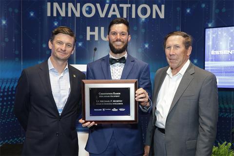 Air Force veteran Christopher Ramos, center, received the 2024 Lieutenant Michael P. Murphy Award at the GEOINT Symposium