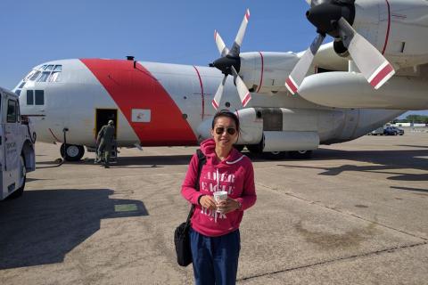 Penn State assistant research professor Sha Feng prepares to board a plane flying as part of the ACT-America project