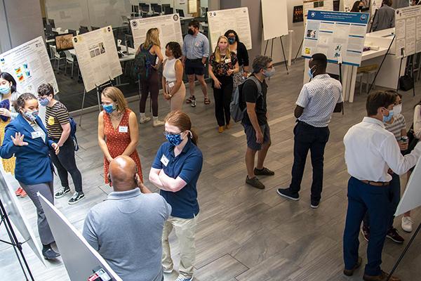 A student symposium in Steidle Building