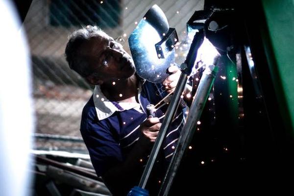 A worker welds 