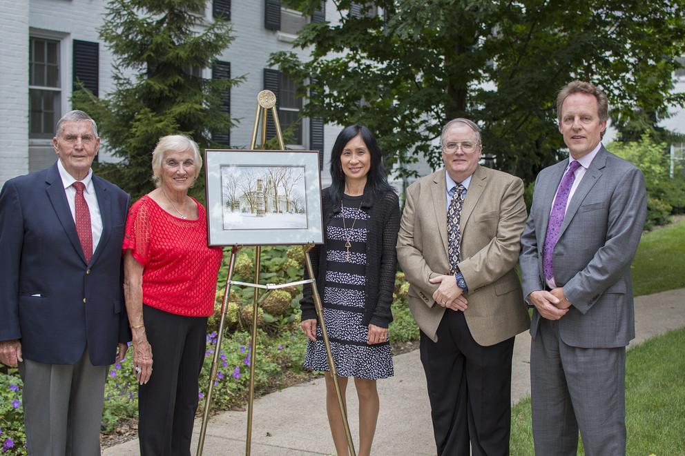 Jon Benesch (second from right) and his wife, Deborah (third from right), created an Open Doors Scholarship in EMS