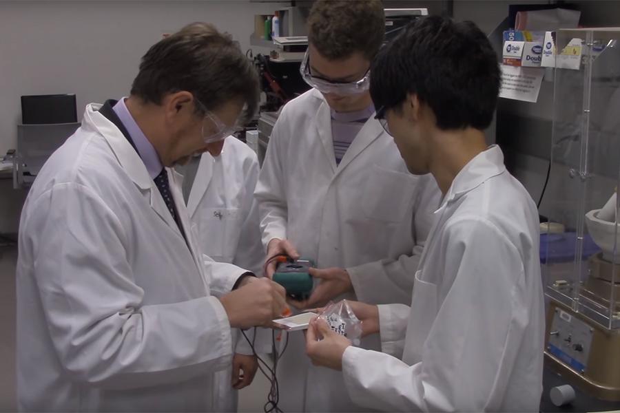 Clive Randall in lab with students