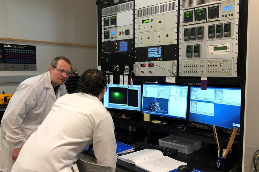 Roman Engel-Herbert, assistant professor of materials science and engineering, characterizes thin films with a grad student