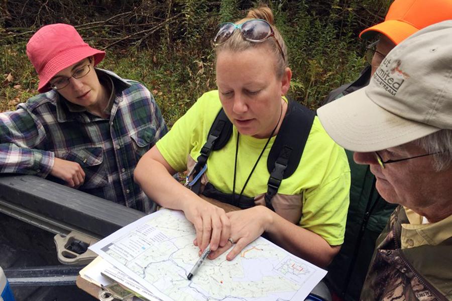 Volunteers collecting water quality samples in the Allegheny National Forest for Snapshot day pause to find another test site.