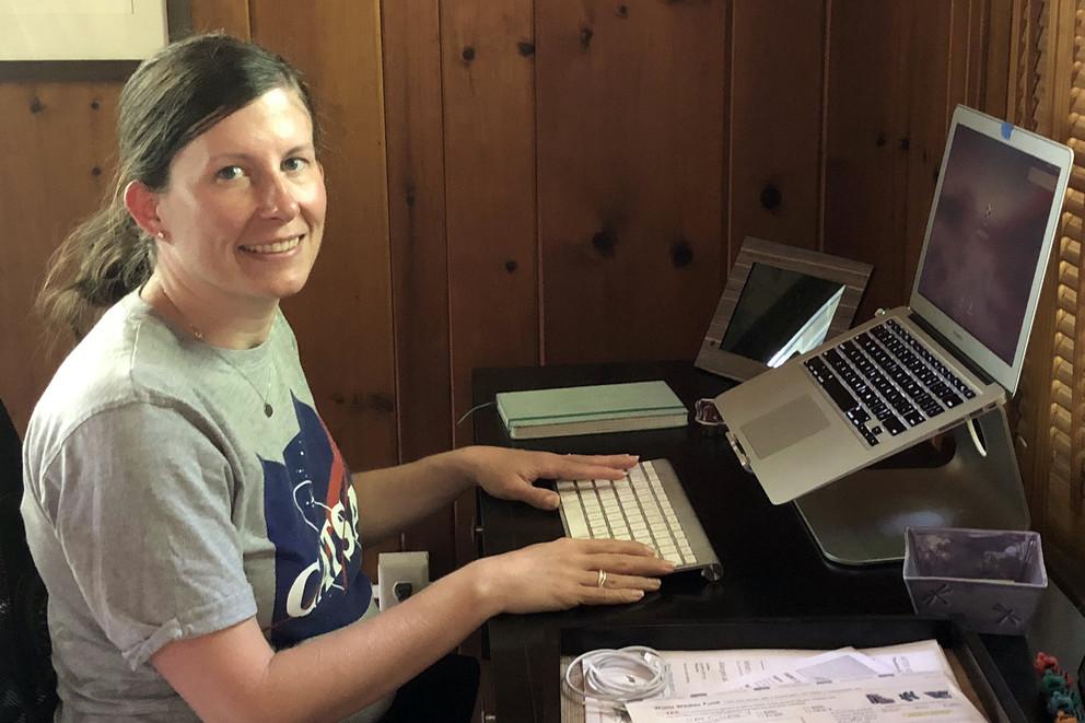 Jennifer Baka, assistant professor of geography , at her home office 