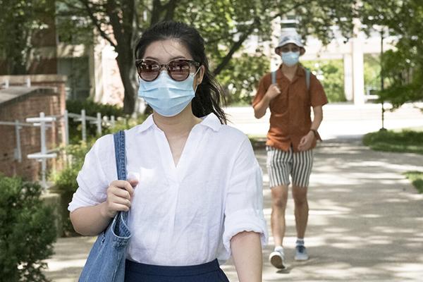 Students walk on Penn State's University Park campus